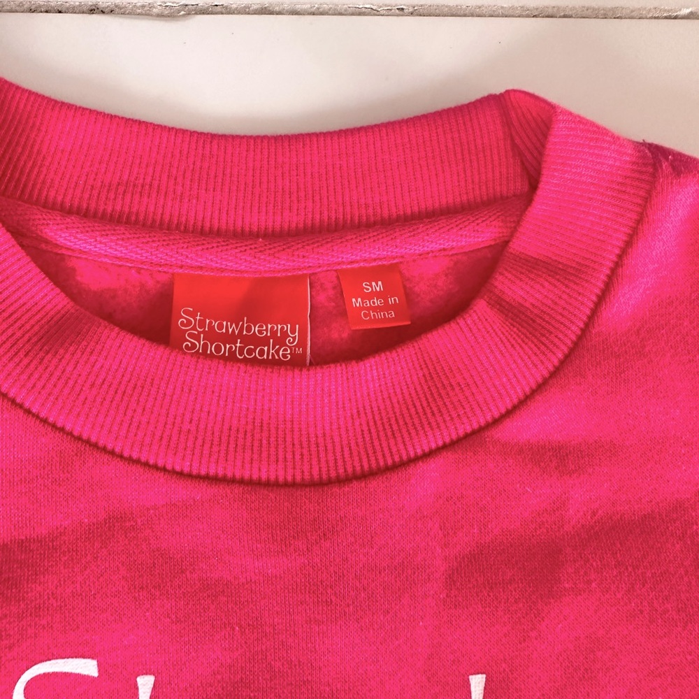Brand new strawberry shortcake sweatshirt.